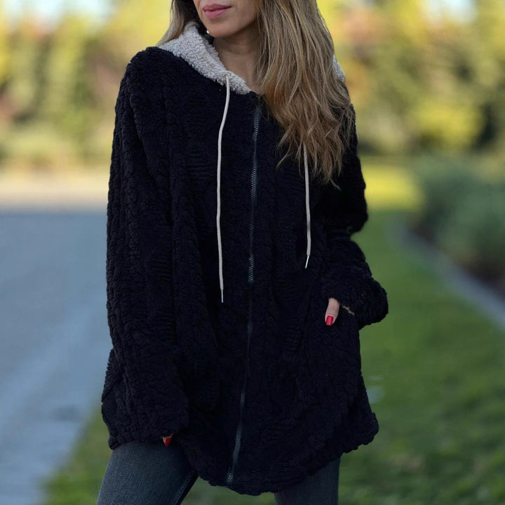 Women's oversized teddy coat jacket with contrasting hood, zipper, and side pockets Mune Fashion