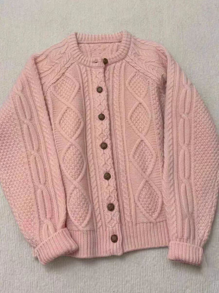 Women's knit cardigan in Aran style with cable and pearl pattern as well as wooden button placket Mune Fashion