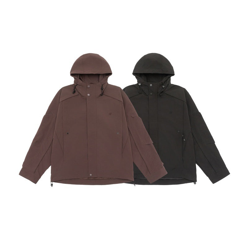 Unisex technical hooded field jacket in boxy cut with concealed front and multifunctional pockets Mune Fashion
