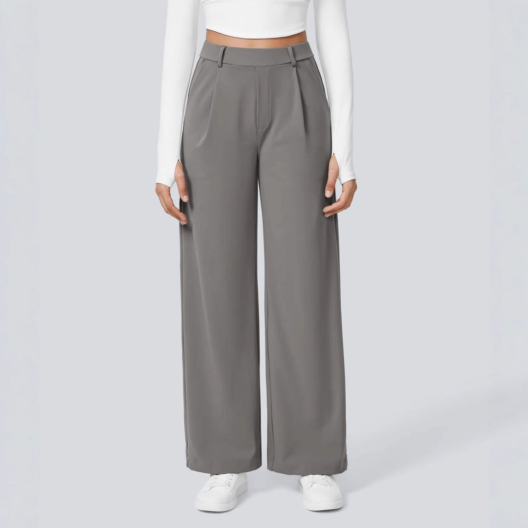 Ladies high-waisted pleated trousers with wide leg, belt loops and side pockets Mune Fashion