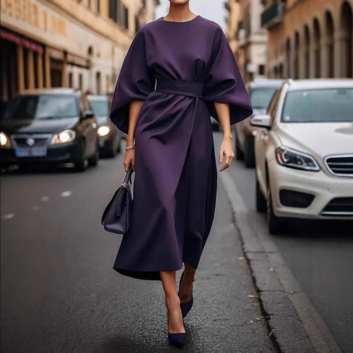 Women's minimalist evening dress with overlong wide sleeves and waist-sculpting pleat draping Mune Fashion