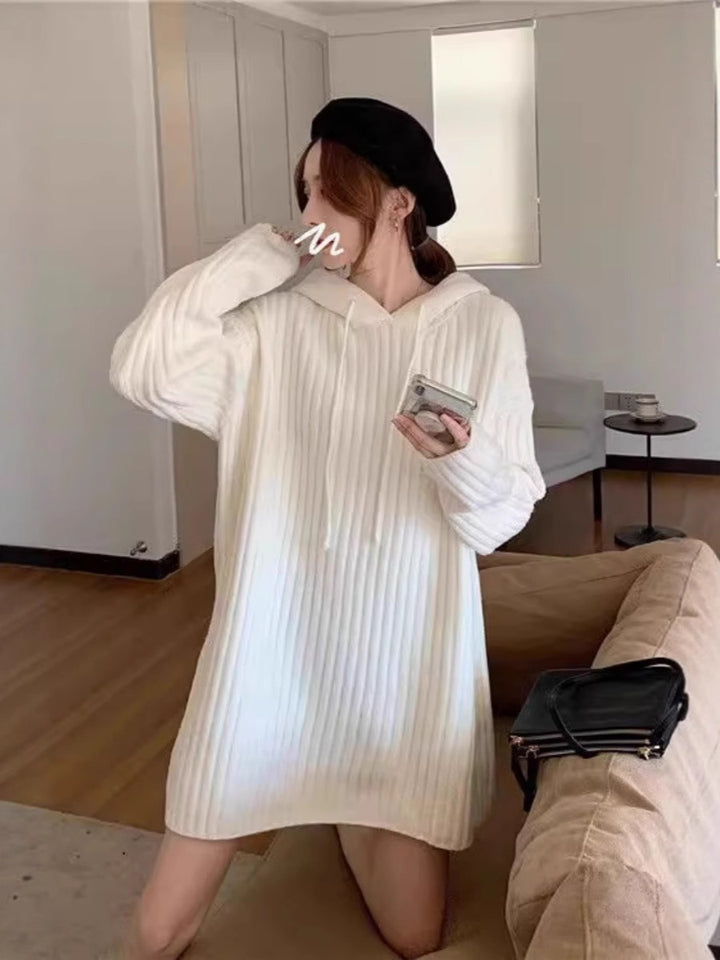 Women’s knitted hoodie dress with ribbed texture and oversized silhouette Mune Fashion