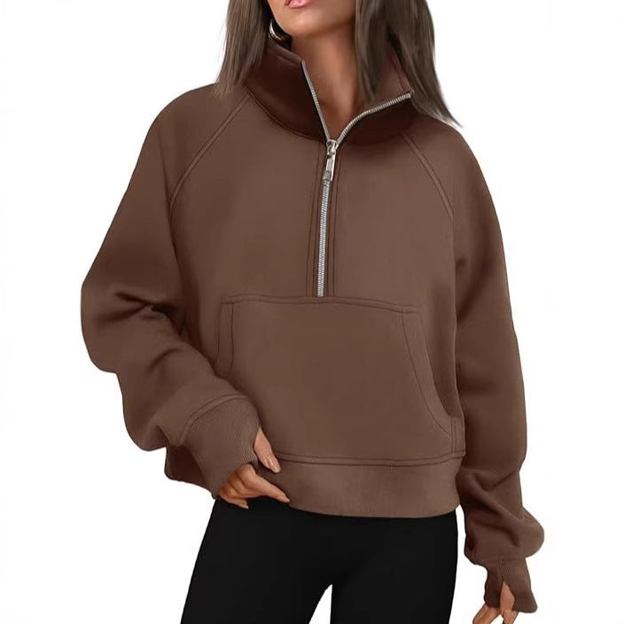 Women's oversized sweatshirt with half zipper, kangaroo pocket, and thumb holes Mune Fashion