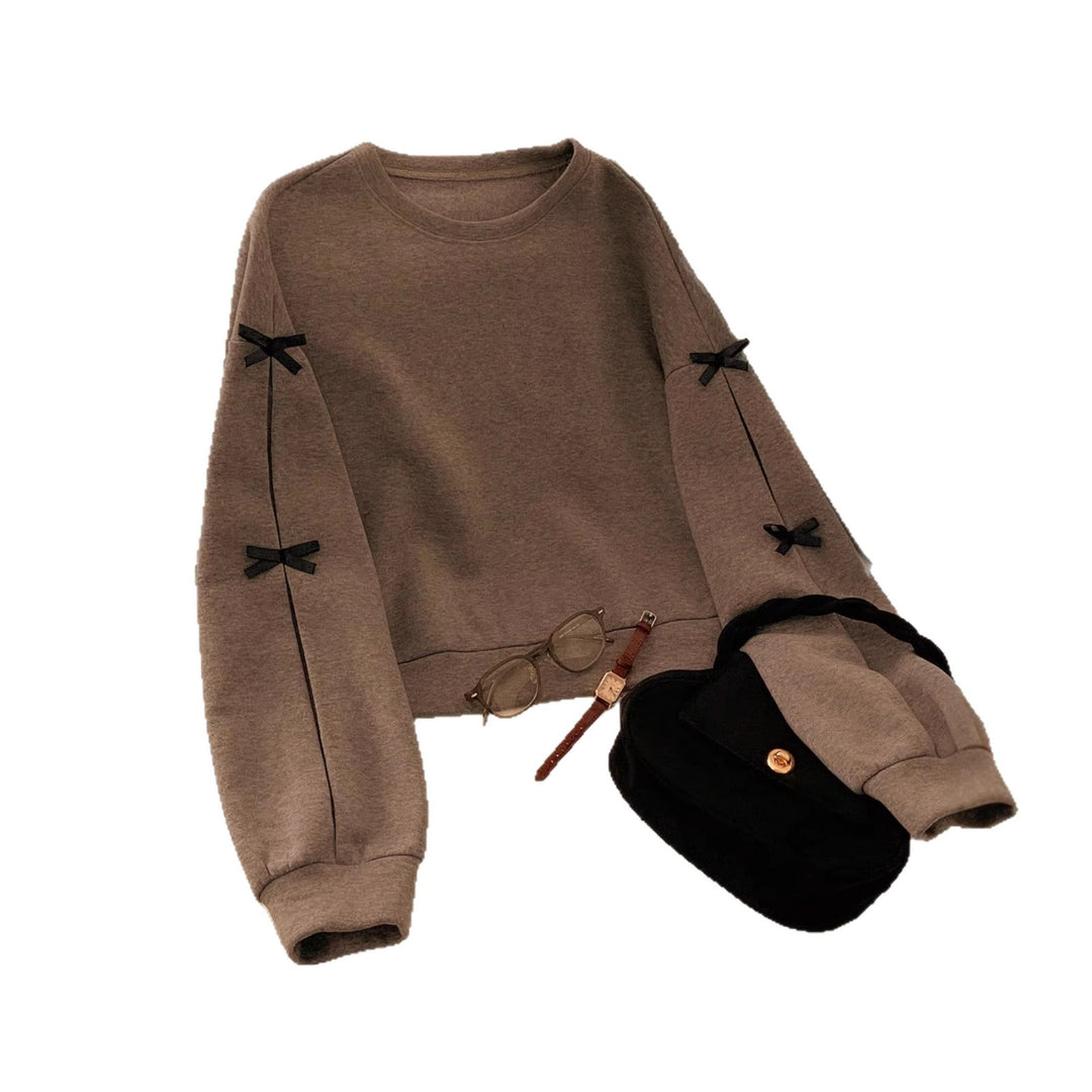 Women’s Oversize Sweatshirt with Decorative Bow Sleeves and Round Neckline Mune Fashion