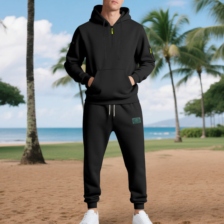 Men's half-zip hoodie and tapered jogger set with kangaroo pocket, zipper details, and elastic drawstring waistband Mune Fashion