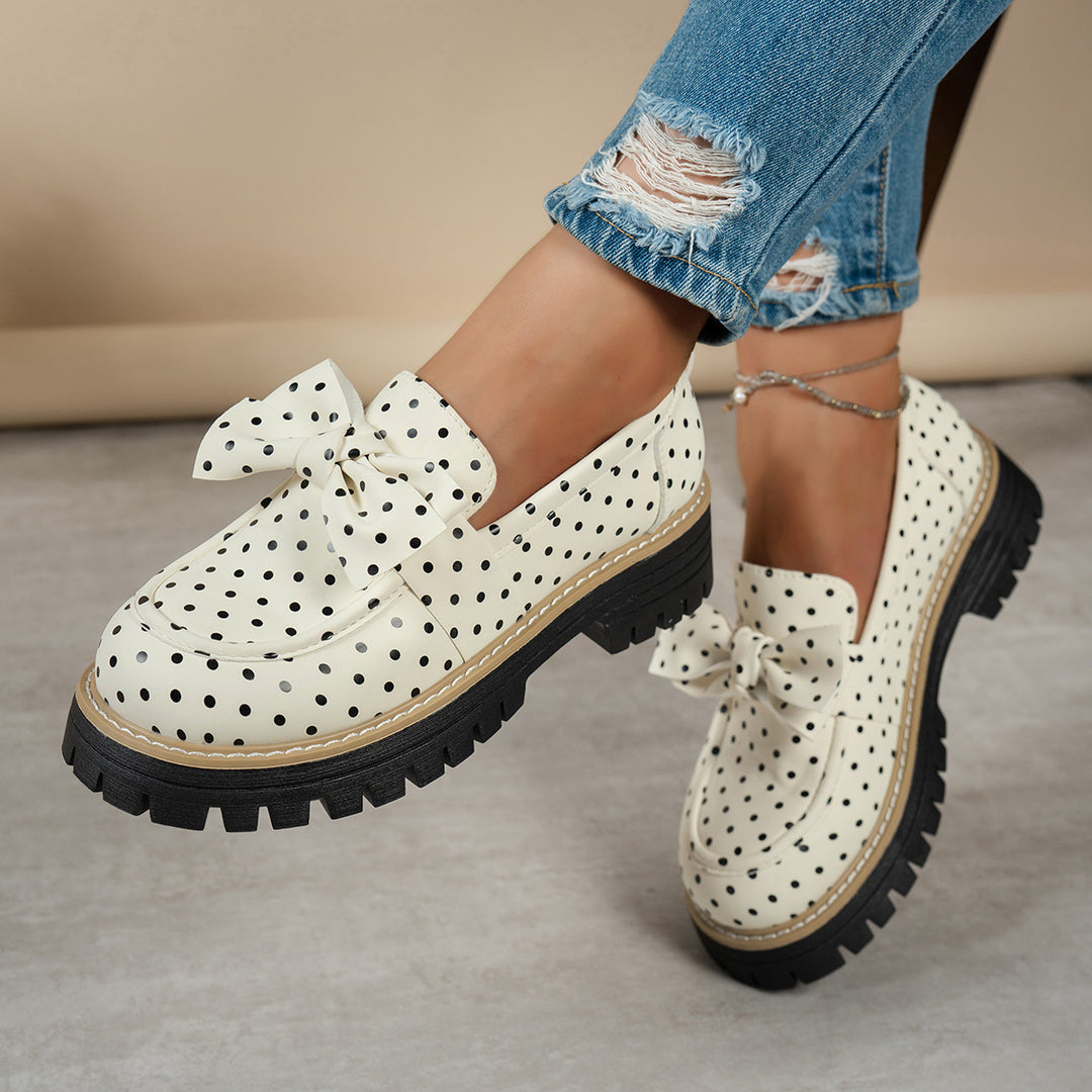 Women's casual loafers with polka dot pattern and decorative bow on a profiled platform sole Mune Fashion