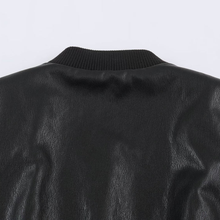 Women's bomber jacket in leather look with hidden flap, figure-hugging ribbed waistband and slanted flap pockets Mune Fashion
