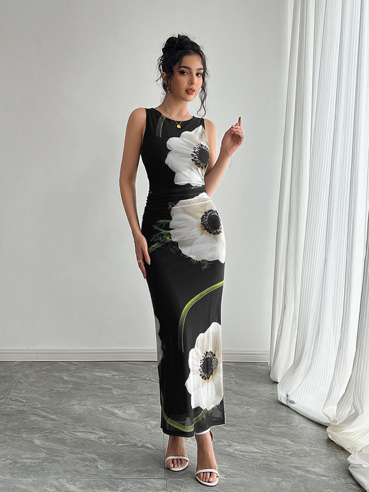 Women's form-fitting sleeveless maxi dress with photorealistic floral print and tailored silhouette Mune Fashion