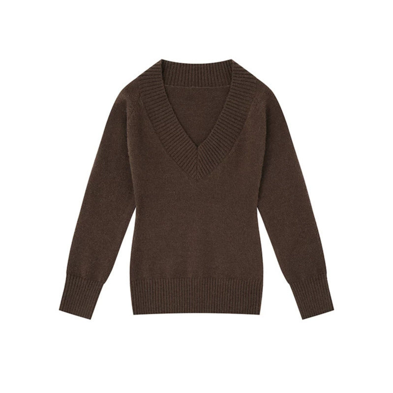 Women's fine knit pullover with deep V-neck, wide ribbed hem, and relaxed fit Mune Fashion