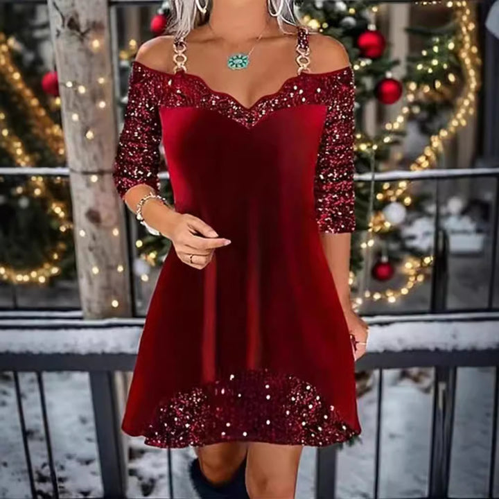 Women's off-shoulder sequin swing dress with delicate chain straps, elbow-length sleeves, and ruffle trim Mune Fashion