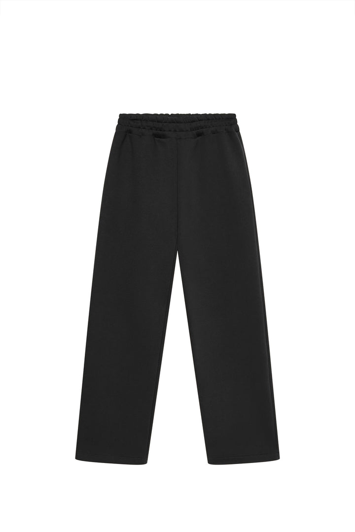 Unisex straight-cut jogging pants with a high elastic waistband and side inset pockets Mune Fashion