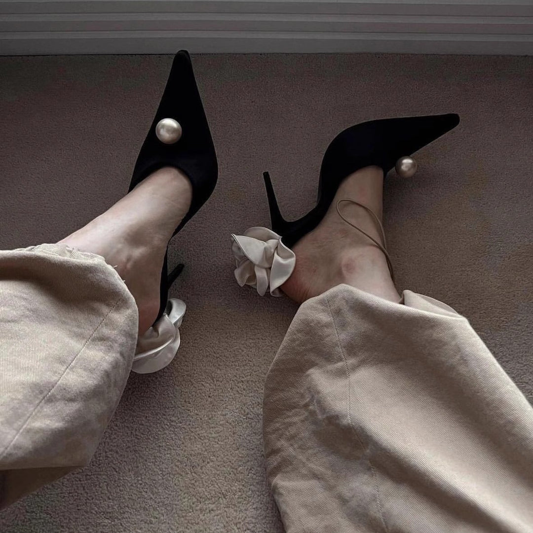 Women's pointed toe mules with decorative pearl, ruffled heel strap, and lace-up strap Mune Fashion