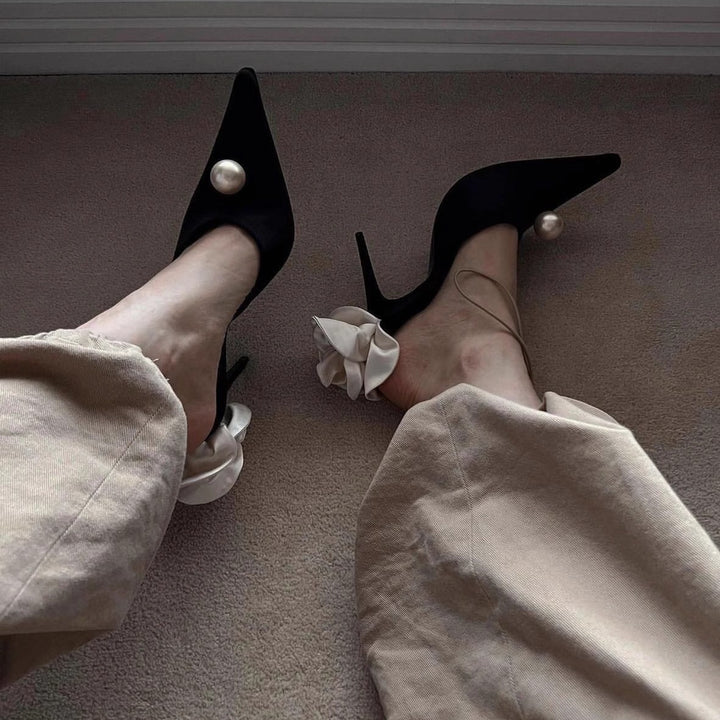 Women's pointed toe mules with decorative pearl, ruffled heel strap, and lace-up strap Mune Fashion