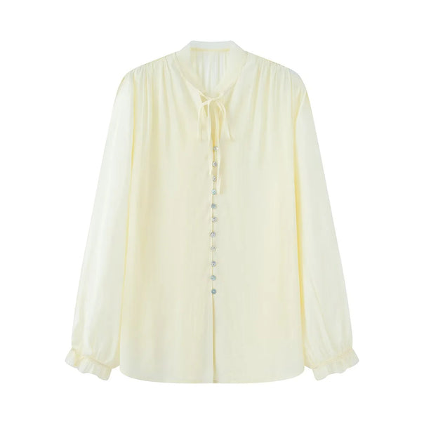 Women's delicate long sleeve blouse with tie ribbon at the neck and fine button placket Mune Fashion
