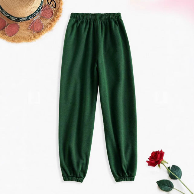 Women's high-cut Relax-Fit jogging pants with elastic waistband, side pockets, and gathered leg cuffs Mune Fashion