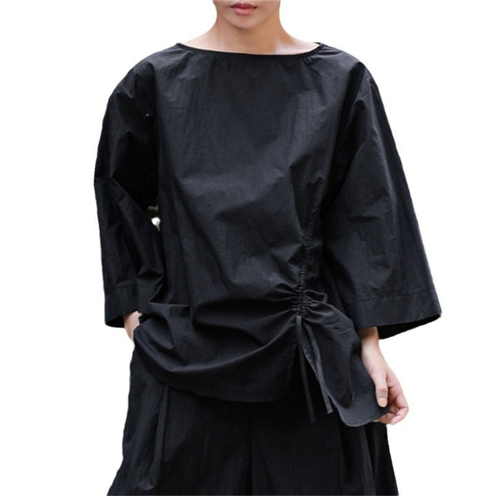 Women's oversized blouse with side cord gathering, bateau neckline, and wide sleeves Mune Fashion