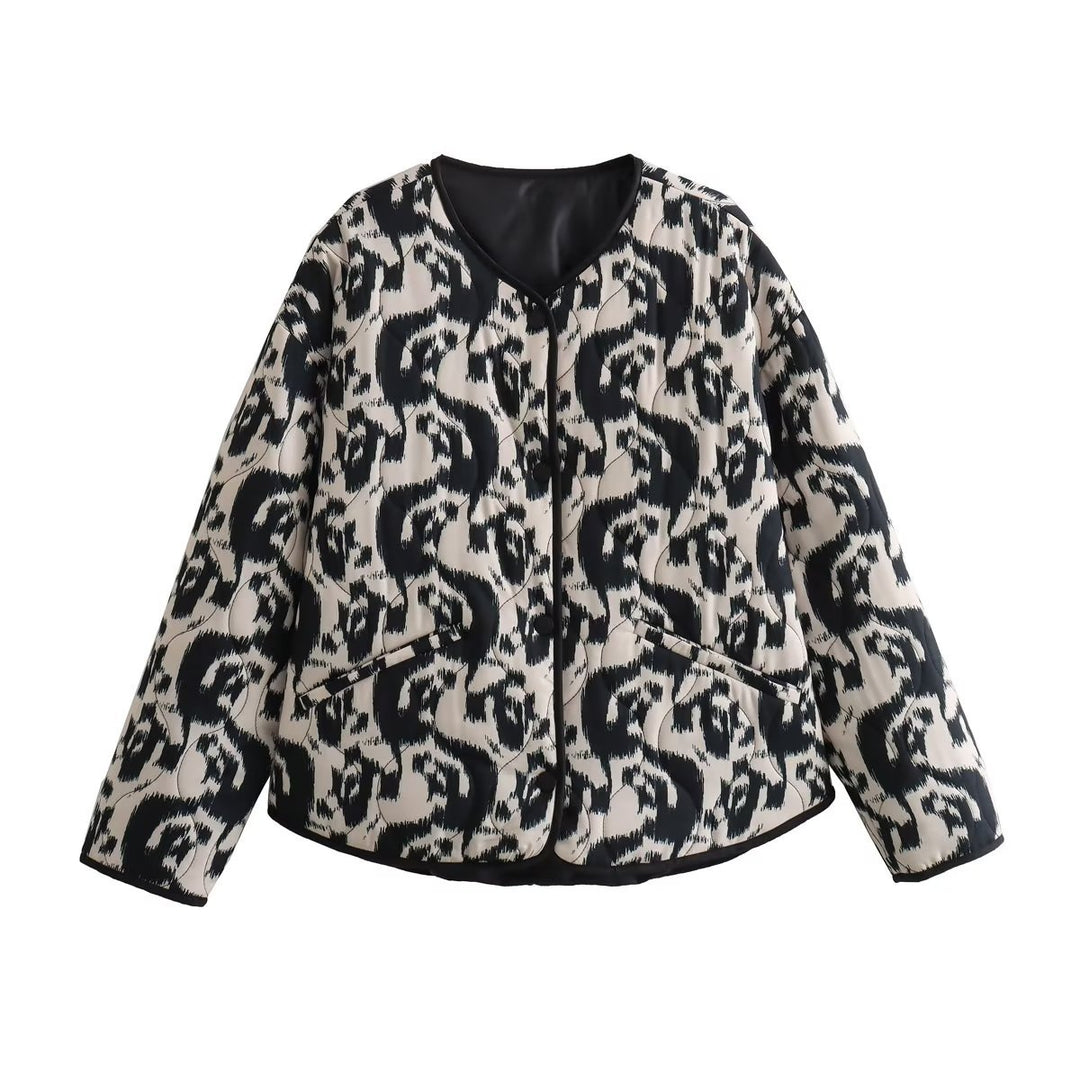 Ladies' quilted short jacket with abstract textured print, lightweight thermal padding, and contrasting piping Mune Fashion