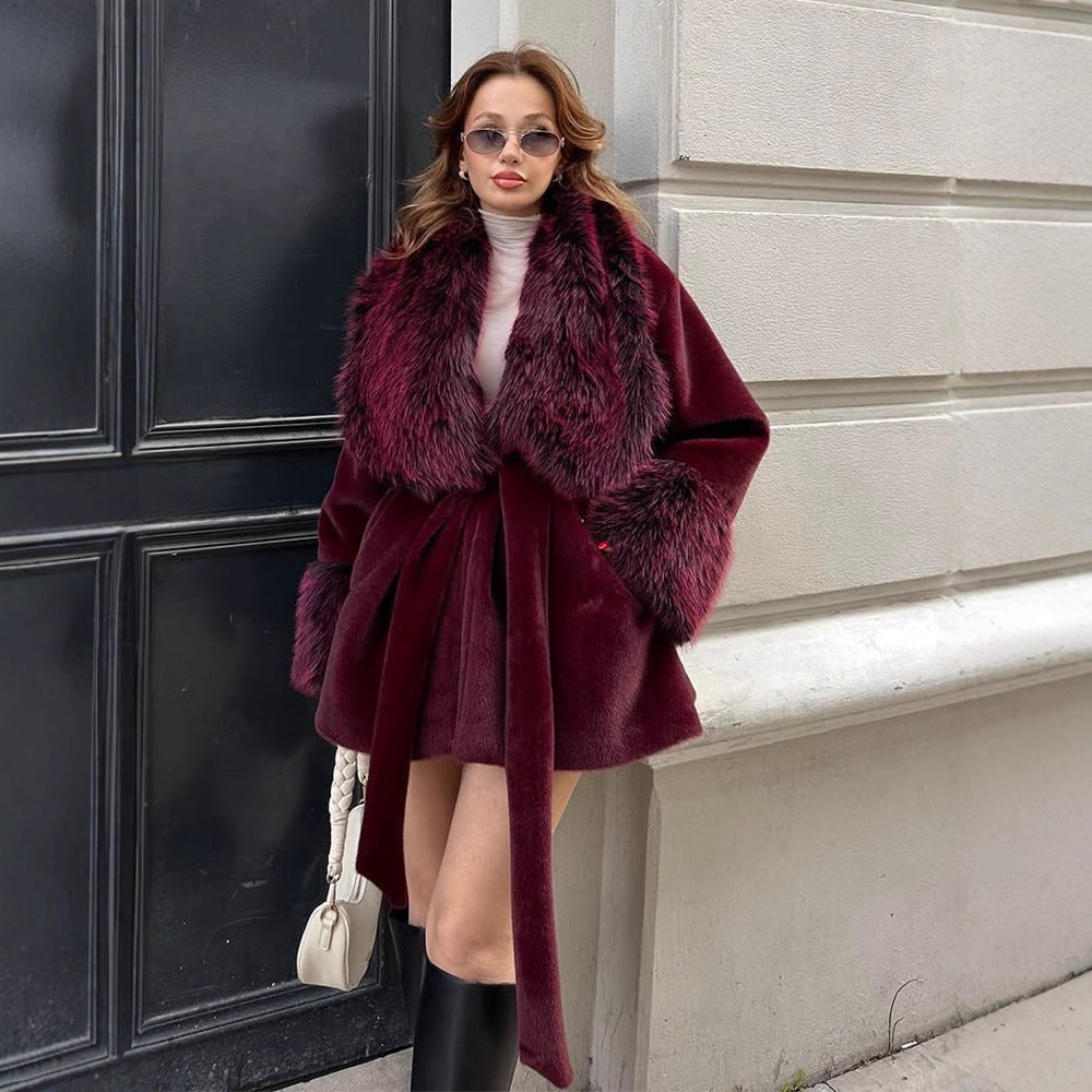Women's Short Faux Fur Coat with Voluminous Shawl Collar, Waist Belt, and Fur Cuffs Mune Fashion