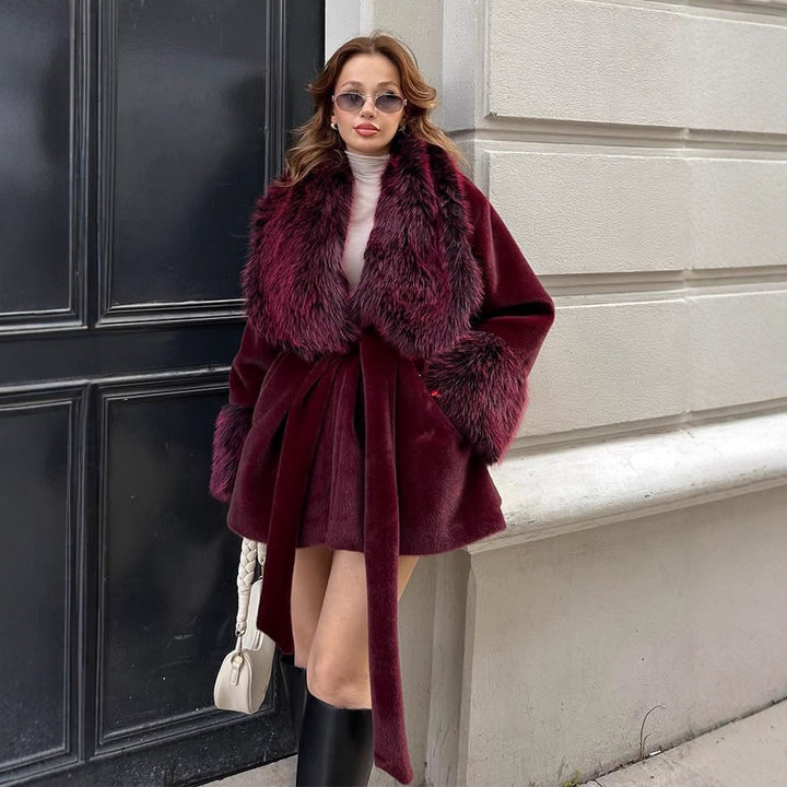 Women's Short Faux Fur Coat with Voluminous Shawl Collar, Waist Belt, and Fur Cuffs Mune Fashion