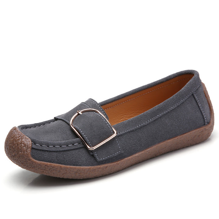 Women's moccasin slippers made of suede leather with decorative metal buckle, padded footbed, and non-slip rubber outsole Mune Fashion