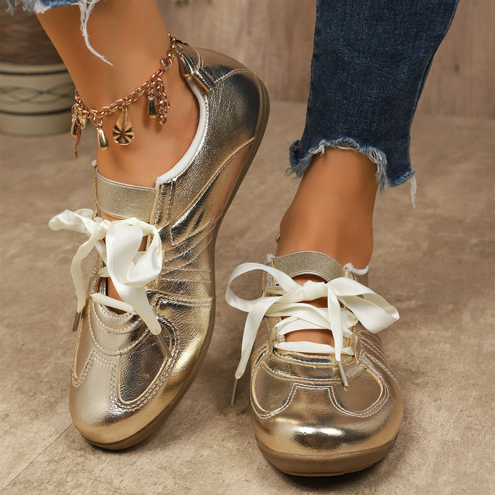 Women’s sporty sneakers with shiny metallic upper material and comfortable lacing Mune Fashion