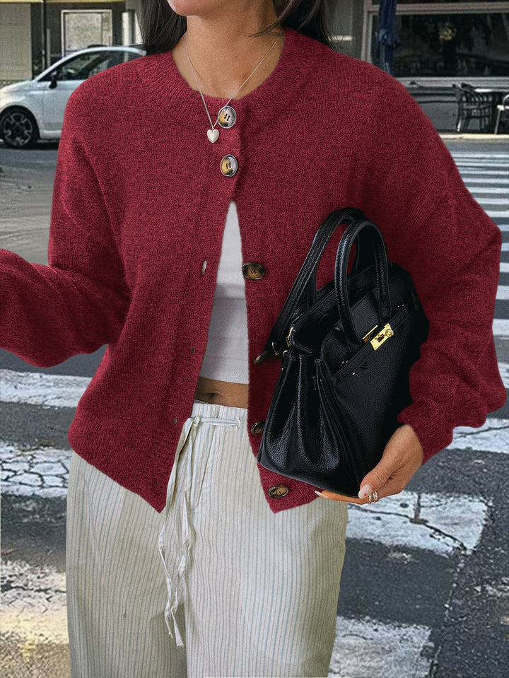 Women's cozy oversized knitted cardigan with horn button placket and round neckline Mune Fashion