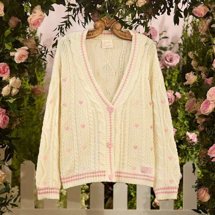 Women’s chunky knitted V-neck cardigan with heart appliqués and decorative heart buttons Mune Fashion