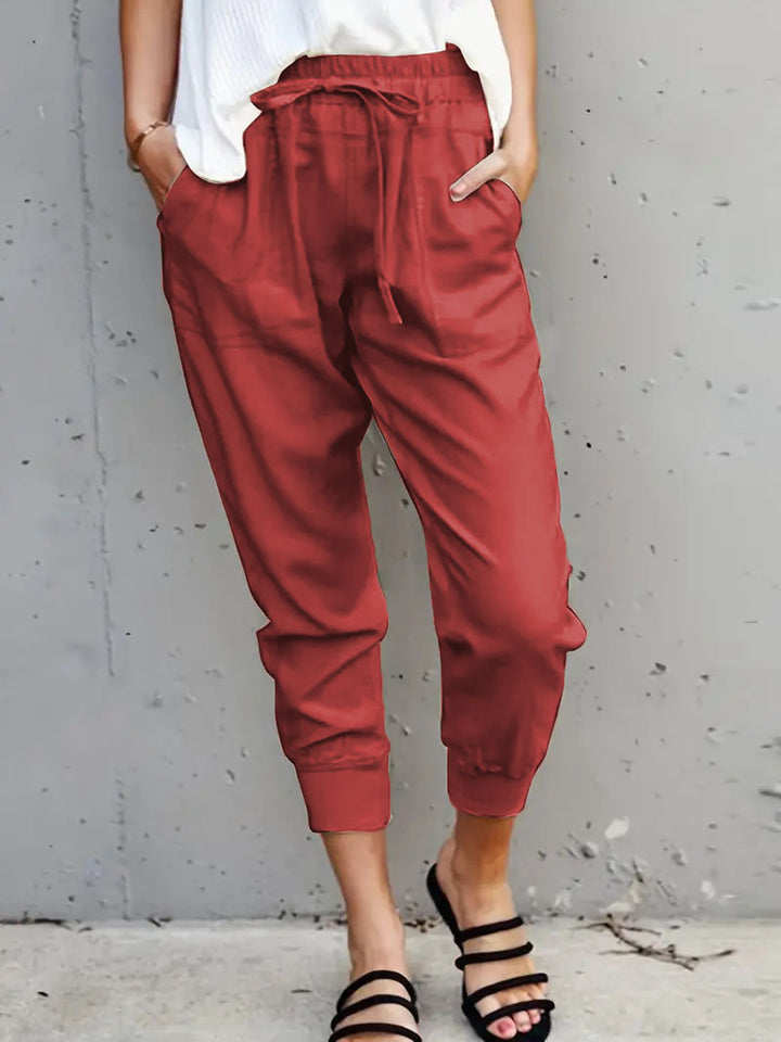 Women's jogging pants with elastic waistband, drawstring and leg cuffs Mune Fashion