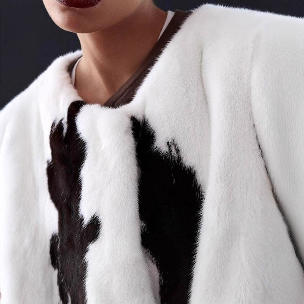 Women's short coat made of faux fur with boxy silhouette and cow print pattern Mune Fashion