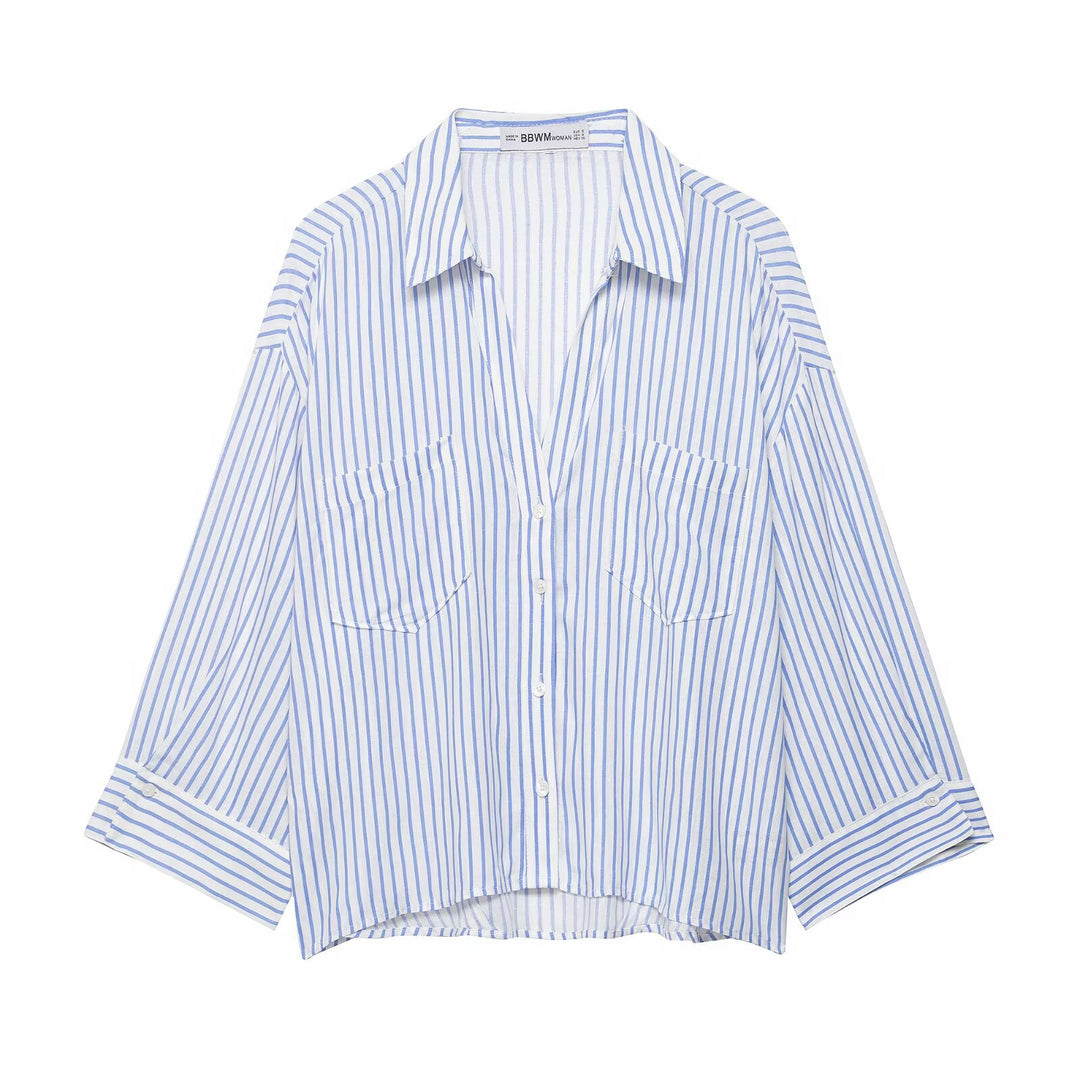 Women's oversized shirt blouse with fine striped pattern, chest pockets, and high-low hem Mune Fashion