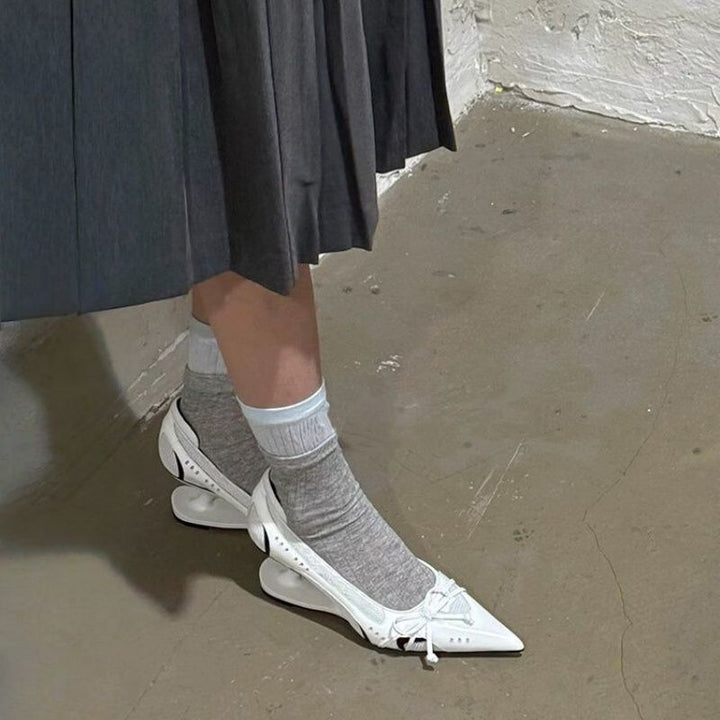 Women's pointed metallic slingback pumps with sculptural heel and bow accent Mune Fashion