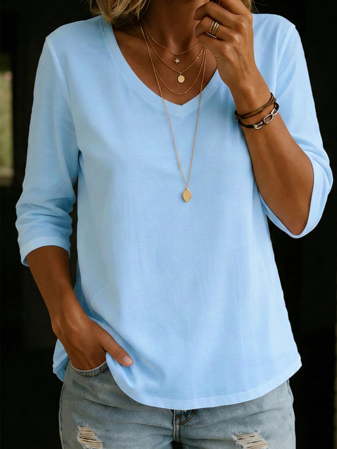 Women's Loose V-Neck Shirt with 3/4 Sleeves and Rounded Hem Mune Fashion