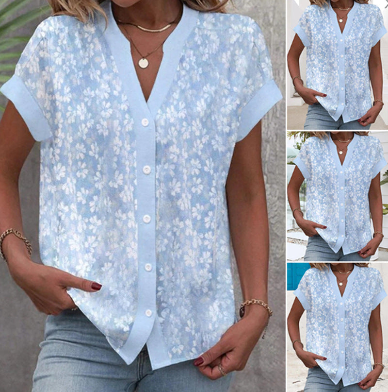 Women's airy button blouse with V-neck, rolled sleeves and floral textured print Mune Fashion
