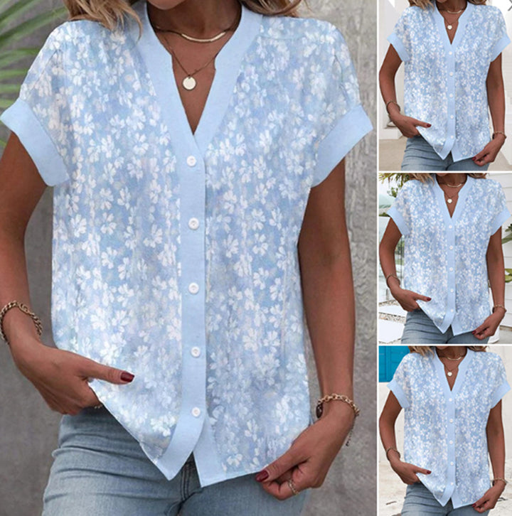 Women's airy button blouse with V-neck, rolled sleeves and floral textured print Mune Fashion