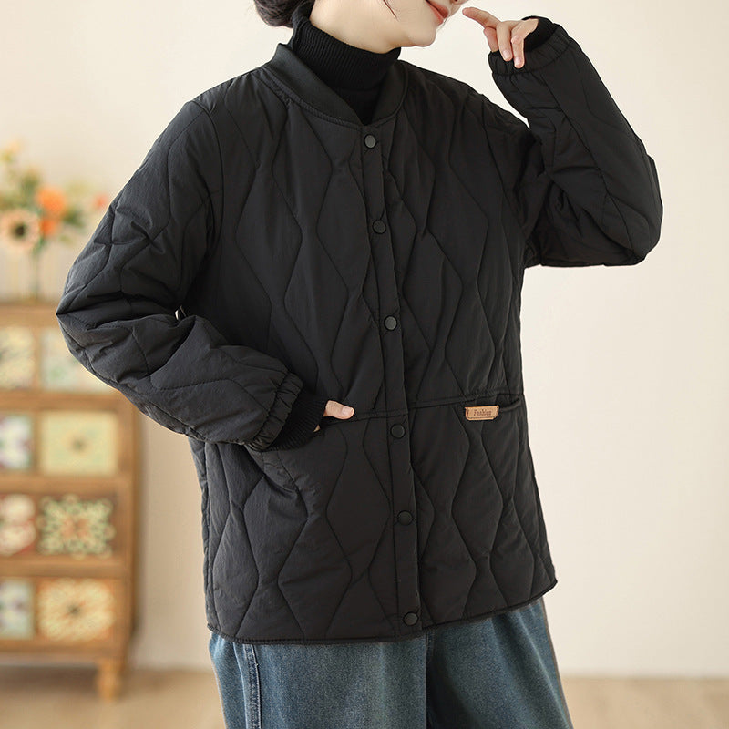 Women's lightweight padded transitional jacket with oversized cut, elastic sleeve cuffs and concealed snap button placket Mune Fashion