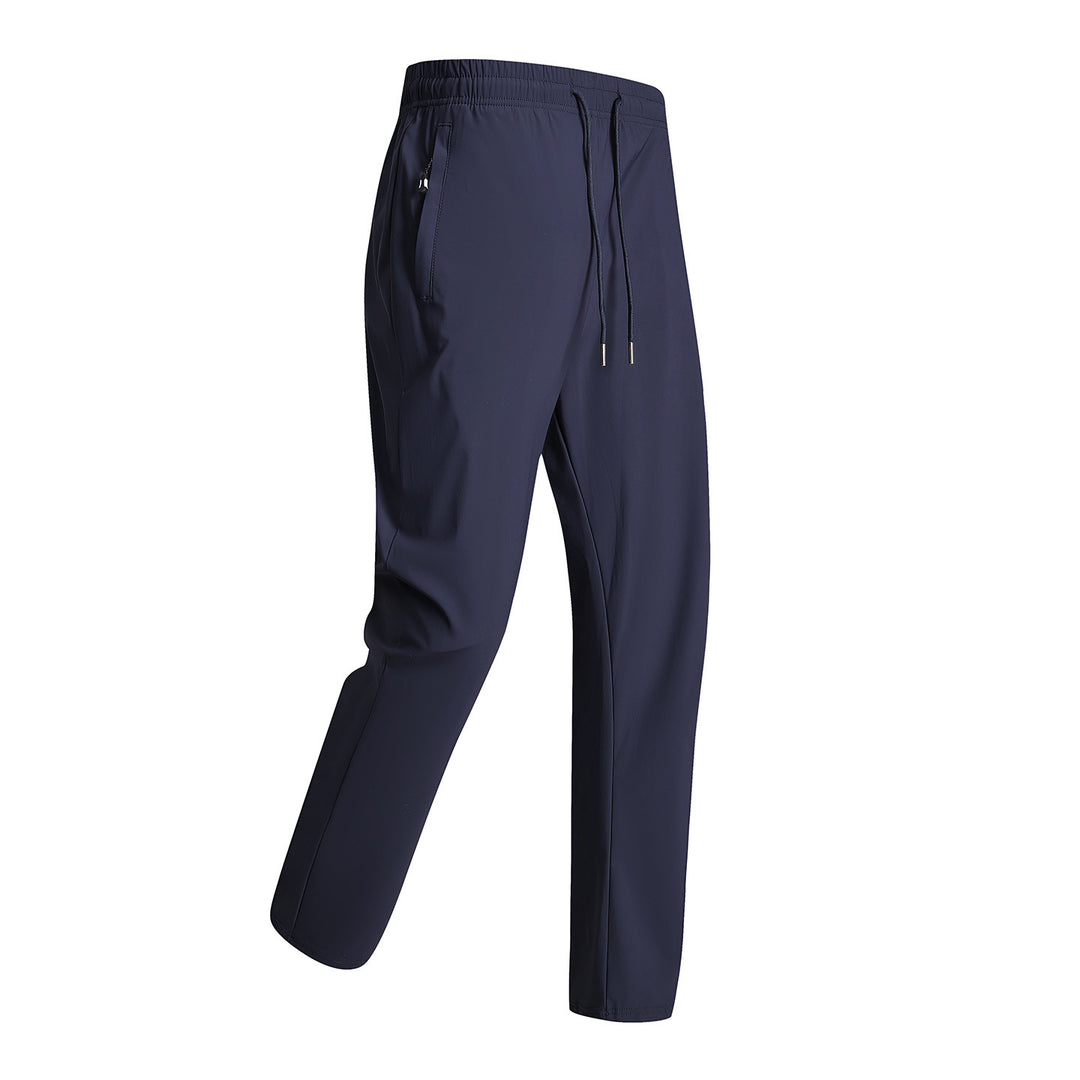 Men's sporty training pants with elastic waistband and zippered pockets Mune Fashion
