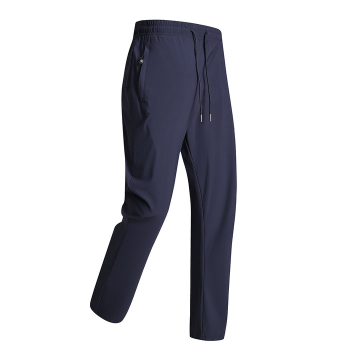 Men's sporty training pants with elastic waistband and zippered pockets Mune Fashion