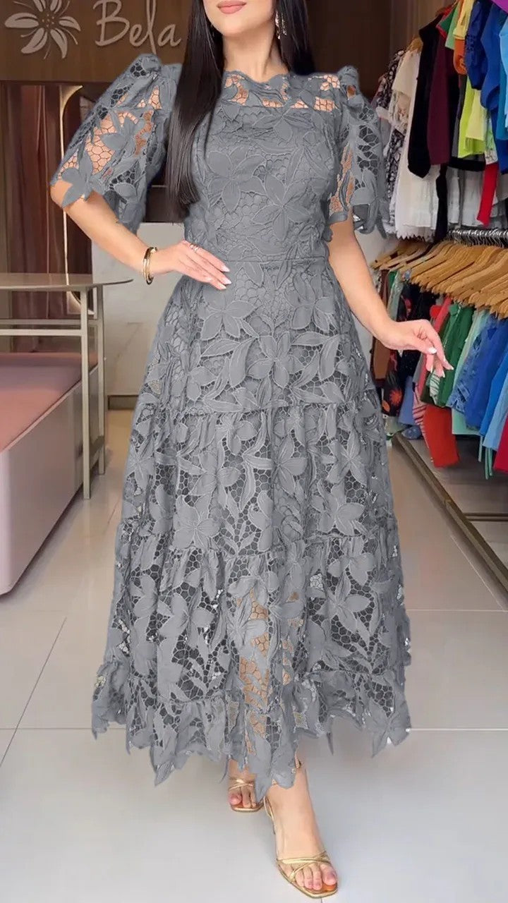 Women's maxi dress made of floral guipure lace with a fitted silhouette and tiered hem Mune Fashion