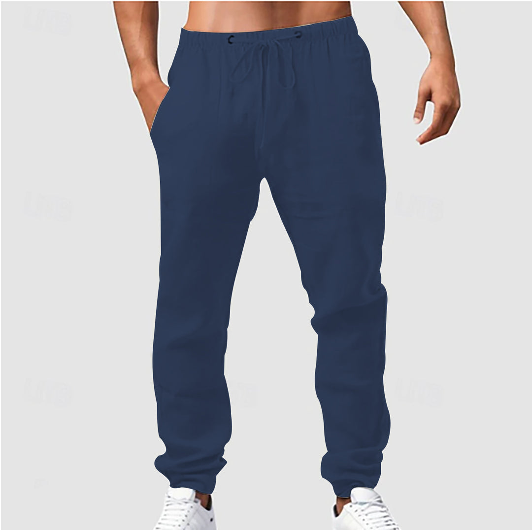 Men's relaxed sporty linen leisure pants with drawstring waistband, elastic ankle cuffs, and side seam pockets Mune Fashion