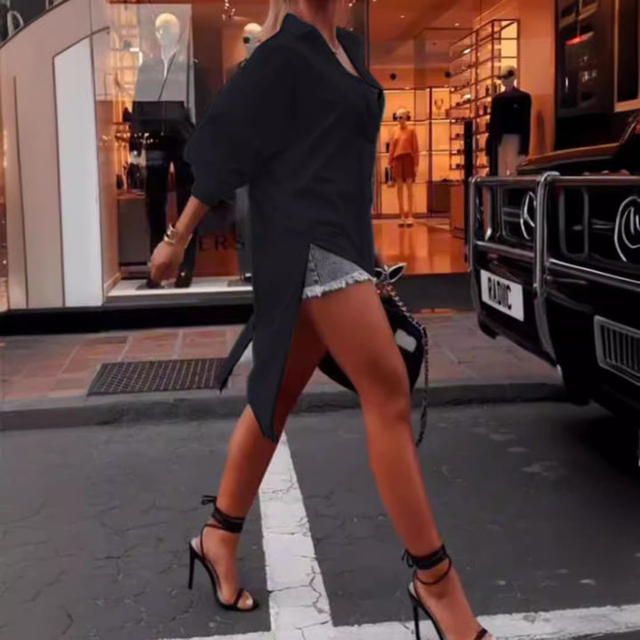 Ladies' oversized shirt dress with central back zipper, split tail hem, and elbow-length batwing sleeves Mune Fashion