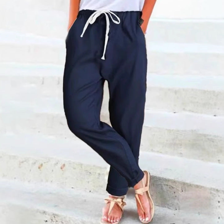Women's casual relaxed pants with elastic waistband, drawstring, side pockets, and rolled hem Mune Fashion