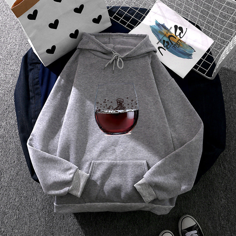 Women’s casual hoodie with photorealistic wine glass graphic, kangaroo pocket, and soft fleece Mune Fashion