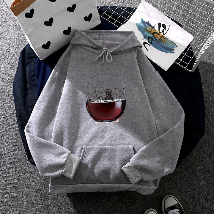 Women’s casual hoodie with photorealistic wine glass graphic, kangaroo pocket, and soft fleece Mune Fashion