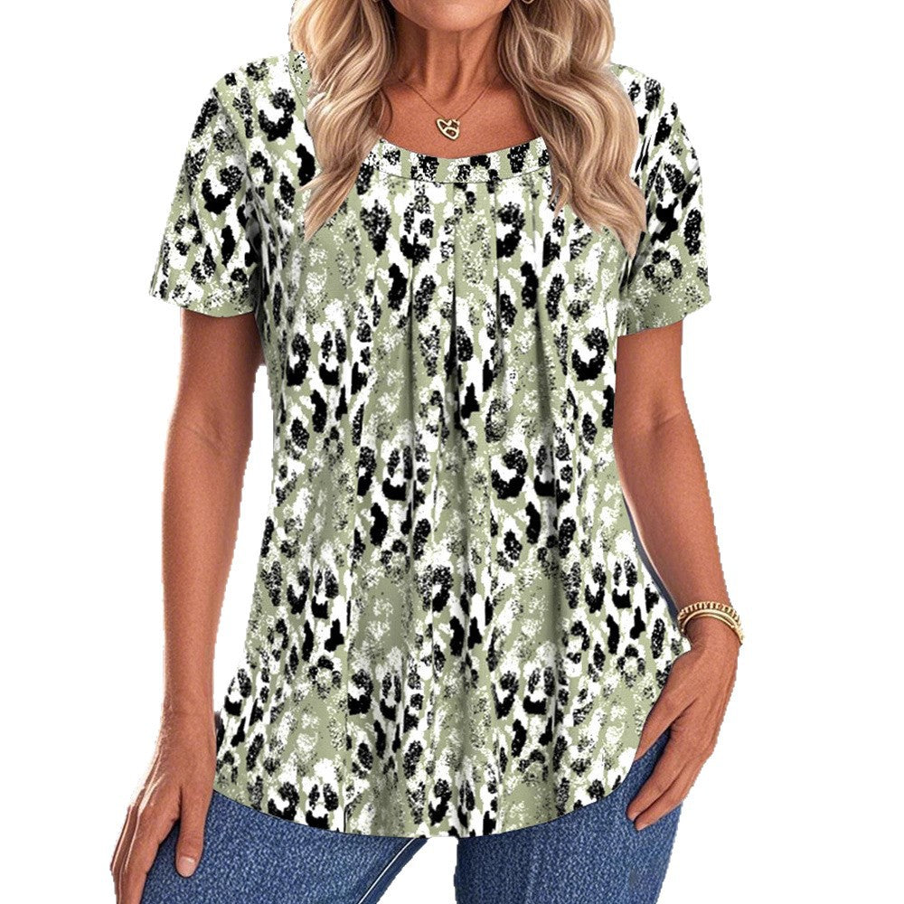 Women loose-fitting short-sleeve blouse shirt with round neckline, bust pleats, and abstract leopard pattern Mune Fashion