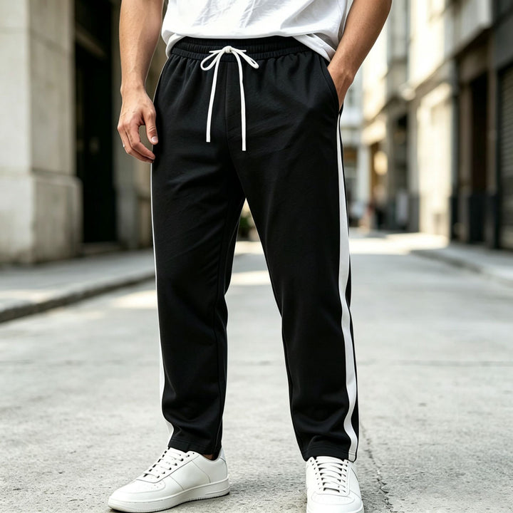 Men's jogging pants with side contrast stripe, elastic waistband and drawstring Mune Fashion