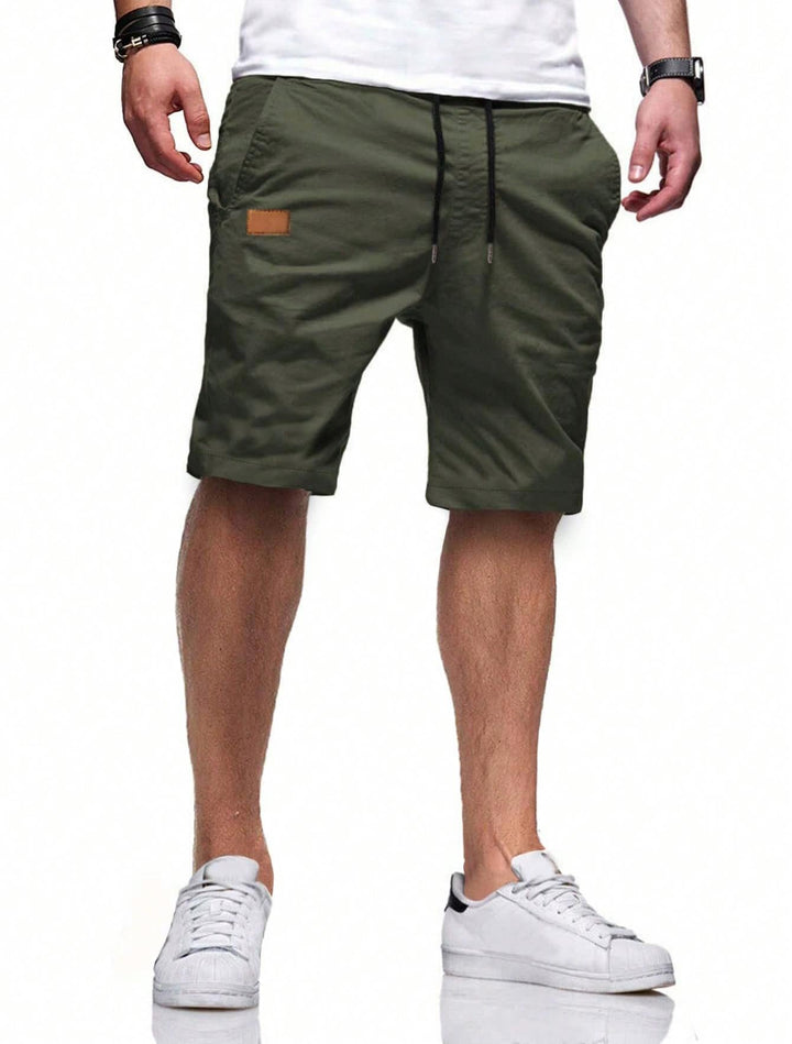 Men's comfortable sports shorts with practical pockets and elastic waistband Mune Fashion