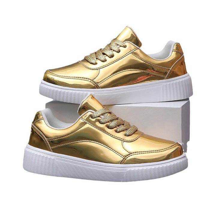 Ladies' low-cut sneakers with reflective patent upper, padded shaft, and raised outsole with groove profile Mune Fashion