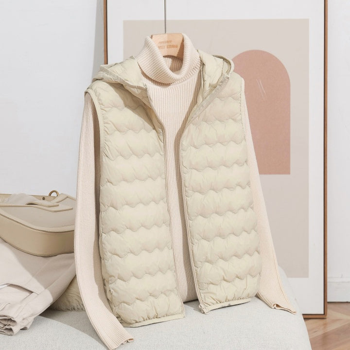 Women Ultra-light Hooded Quilted Vest with Ergonomic Wave Quilting and Compact Packing Format Mune Fashion