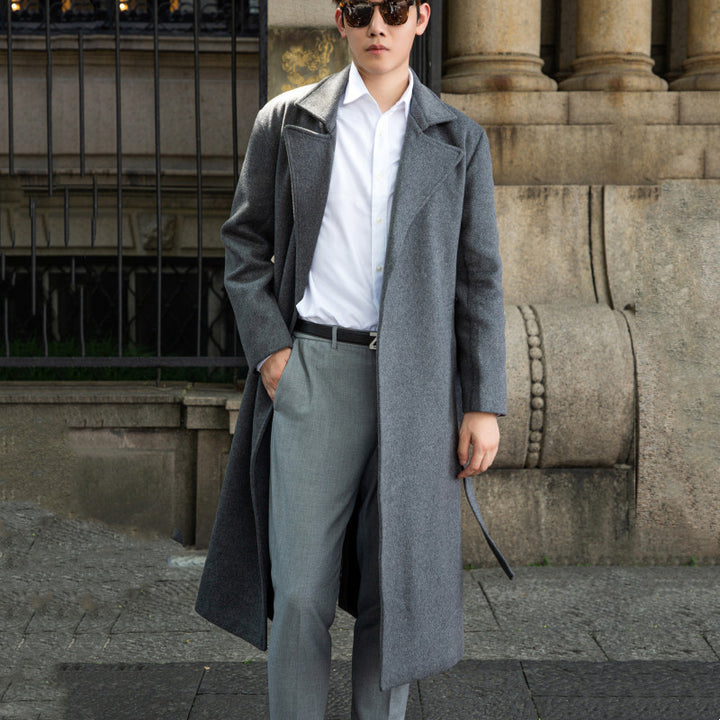 Men's long cut wool coat in minimalist design with generous shawl collar and concealed button placket Mune Fashion