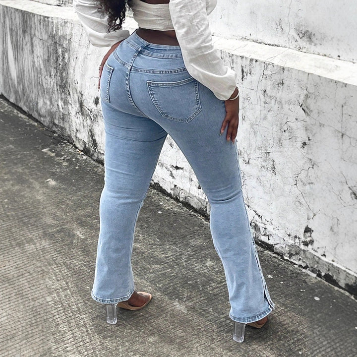 Women High-Waist Stretch Jeans with light flare and side snap button details Mune Fashion